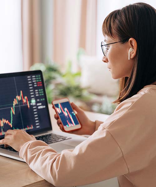 Investor reviewing portfolio on tablet